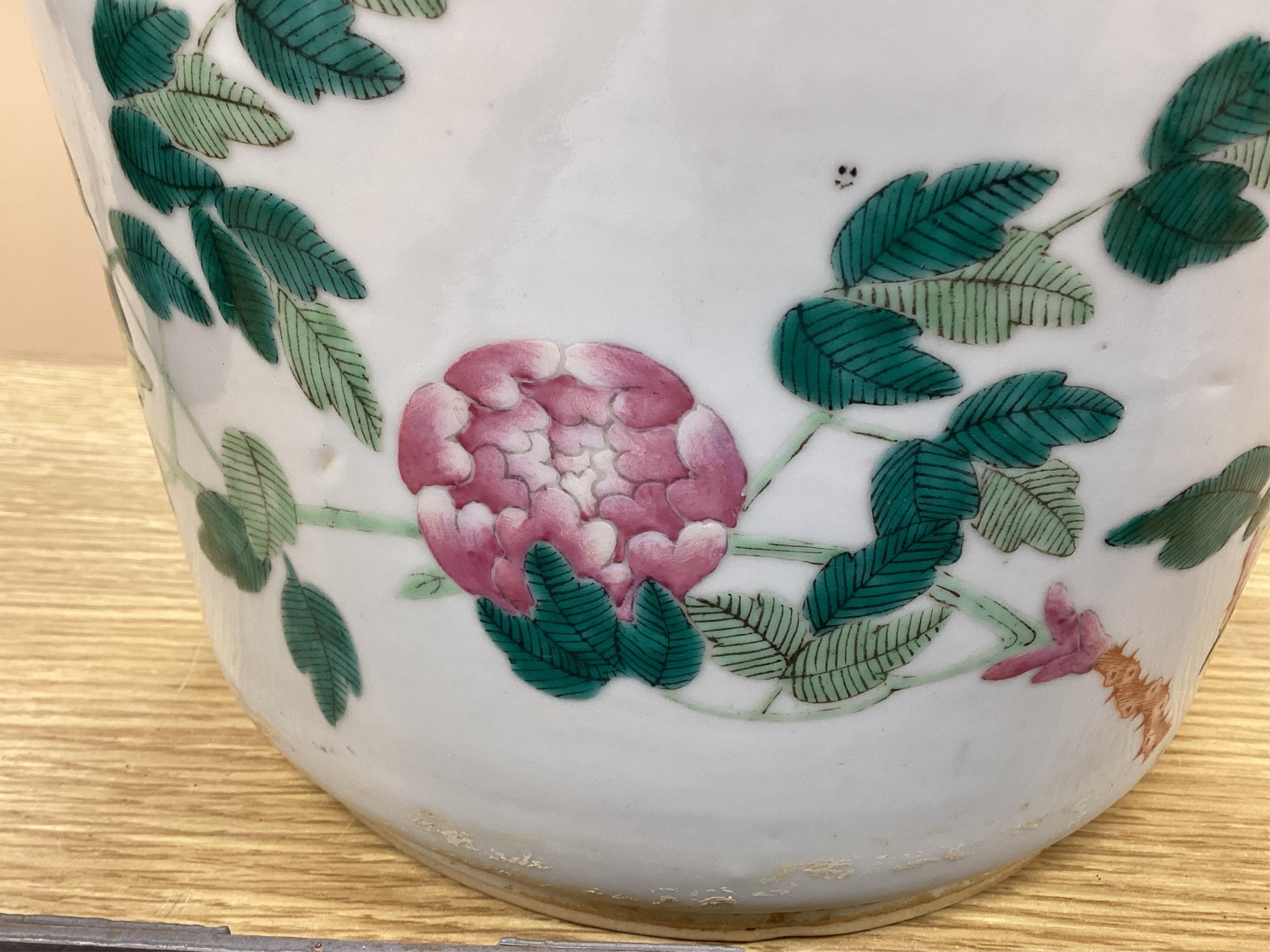 A 19th century Chinese famille rose flower pot, 19.5cm high. Condition - hole drilled to base.